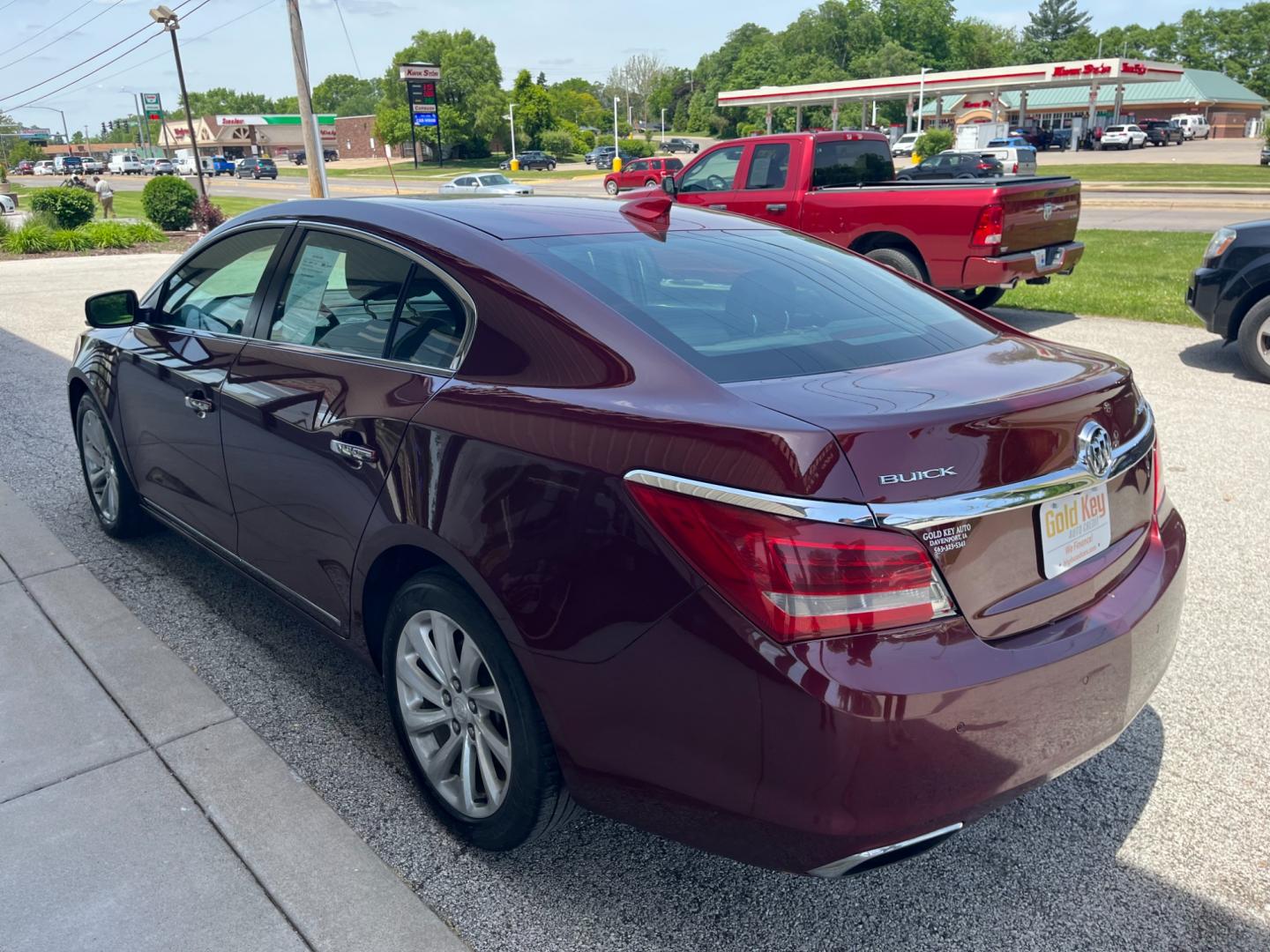 2016 Deep Garnet Metalllic Buick LaCrosse Leather Package (1G4GB5G32GF) with an 3.6L V6 DOHC 24V FFV engine, 6-Speed Automatic transmission, located at 1633 W Kimberly, Davenport, IA, 52806, (563) 323-5341, 41.559456, -90.598732 - Photo#3